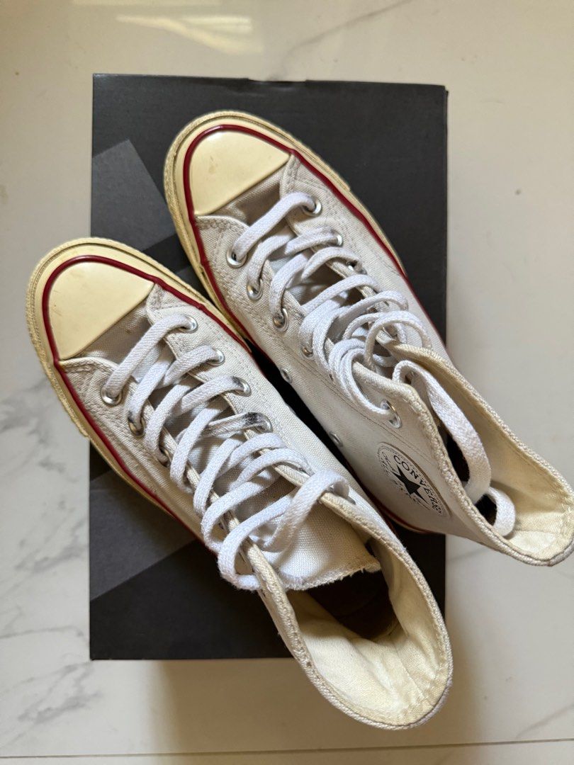 [REPRICED] Converse Chuck 70 High (Category: Sneakers) located in Baguio. Submitted by declutterwithra (Listing ID 1368874229, Image 2). Description: Converse Chuck High 70s Used Condition: 9/10 RFS: Decluttering No Box No sole sep, minor tear on the toe box EU 35 UK 3 22cm .