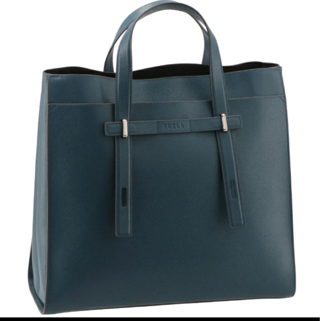 Furla Giove Tote (Category: Luxury Bags & Wallets) located in Mandaluyong City. Submitted by ericrn (Listing ID 1368786912, Image 1). Description: With small rubs at the bottom part. Please see the last 2 pictures. [Specifications] Open closure 1 outer pocket (open type) 5 inner pockets (zipper type, open type) 1 pen stab 1 D-ring [Material] Calfskin [Color name] NERO [Hardware] Silver [Size] Length 35.5cm x width 38cm x gusset 14cm Handle: 40.4c