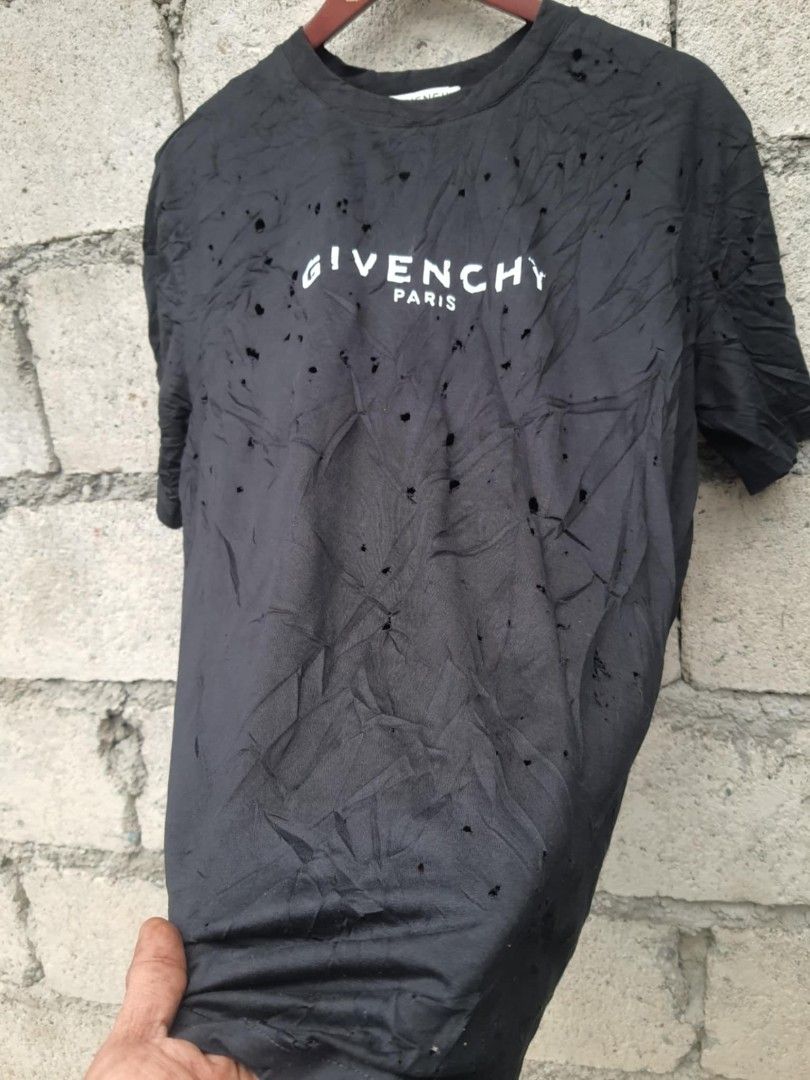 Givenchy destroyed t shirt like new (Category: Luxury Apparel) located in Bayombong. Submitted by jeffbeeer (Listing ID 1368906611, Image 2). Description: small on tag oversize fits xl men 2xl womens 29 length 23 width GOOD AS NEW 💯.