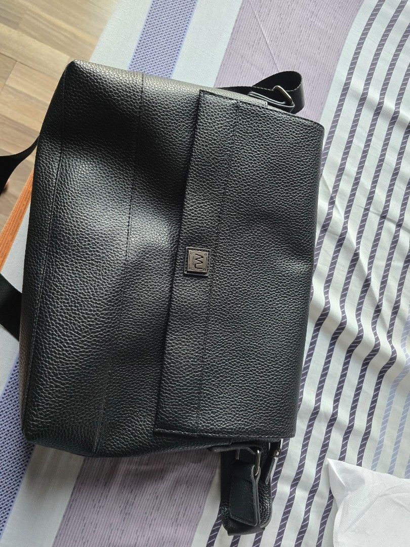 Laptop bag (Category: Briefcases) located in Quezon City. Submitted by jonjonlor (Listing ID 1368778712, Image 1). Description: Selling my leather laptop bag for 13 and 14" laptop. almost new 2 months old only. message me if interested.