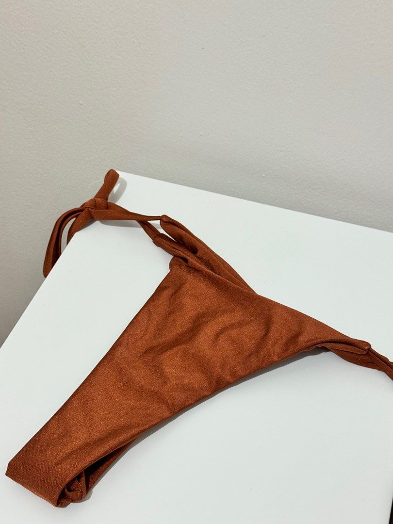 Self-Tie Brown Bikini (Small) (Category: Bikinis & Swimsuits) located in Cavite. Submitted by mfcenv (Listing ID 1368356938, Image 3). Description: Size: Small Never been used RFS: Decluttering MOP: Gcash/Maya/Bank Transfer Feel free to dm for more details 🤍.