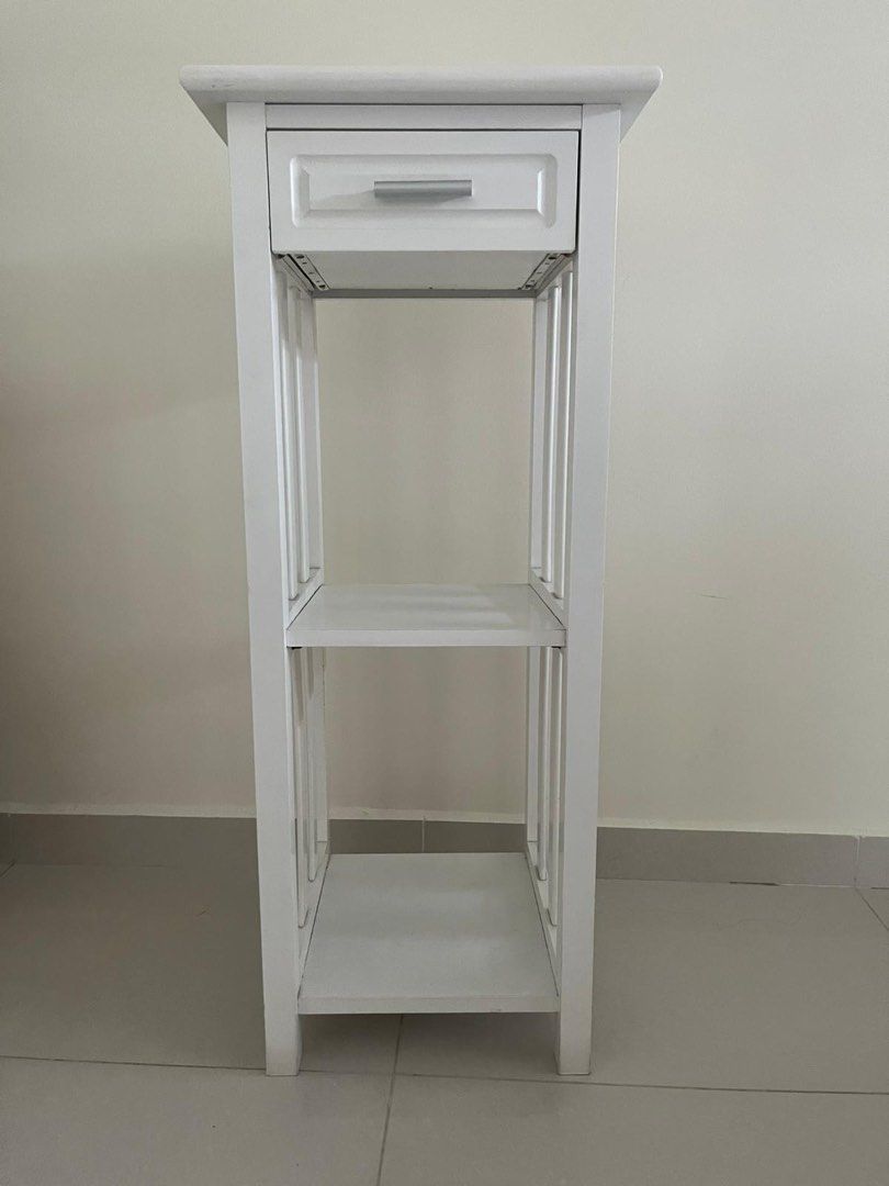 Side Table (Category: Shelves, Cabinets & Racks) located in Singapore. Submitted by koalaxcat (Listing ID 1368852510, Image 2). Description: - Side Table with 1 Drawer - Made of solid wood and MDF board - Can used as telephone rack or bedside table - Colour white - Dimension : L380mm x W380mm x H910mm.