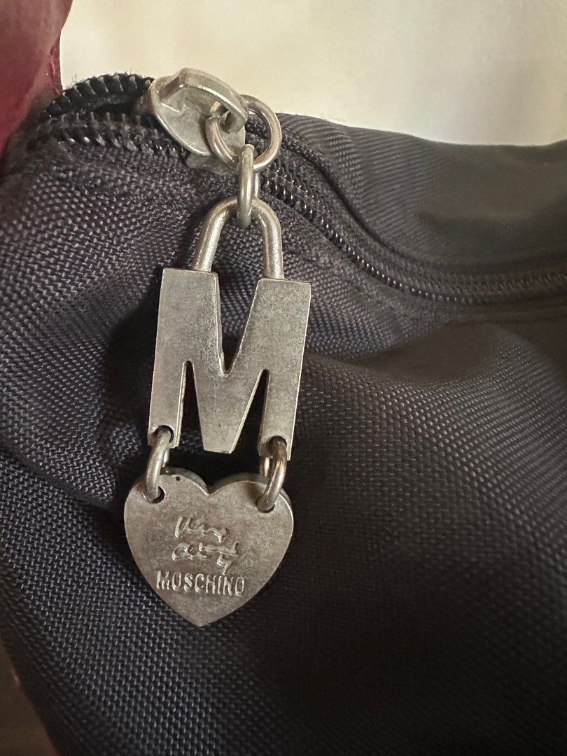 Vintage Moschino Cheap and Chic bag (Category: Luxury Bags & Wallets) located in Muntinlupa City. Submitted by belica (Listing ID 1368897509, Image 2). Description: Vintage Moschino Cheap and Chic bag. 🤗Preloved, please manage your expectations. 📦Shipping of FRAGILE items at buyers risk. 🤝ALL SALES FINAL! 🚫No return, no exchange, no refund. 🛒Happy Shopping!.