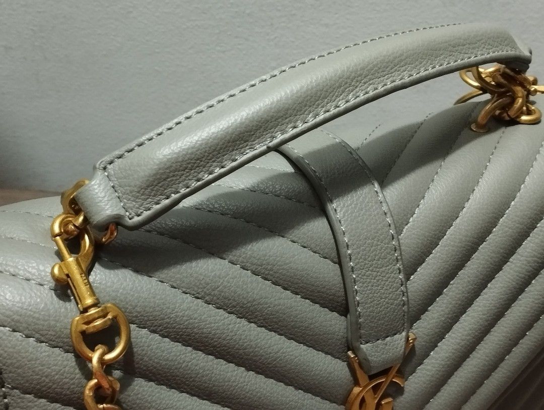 YSL College bag (Category: Luxury Bags & Wallets) located in Rizal. Submitted by shoppin_craze (Listing ID 1368909616, Image 3). Description: vintage look ysl college, green gray in color. japan sourced. visible flaws on leather since not used for a long time and was just stored. can possibly be treated for bag spa. coded free sf no Cod Mop- Bpi, Gcash, Maya.