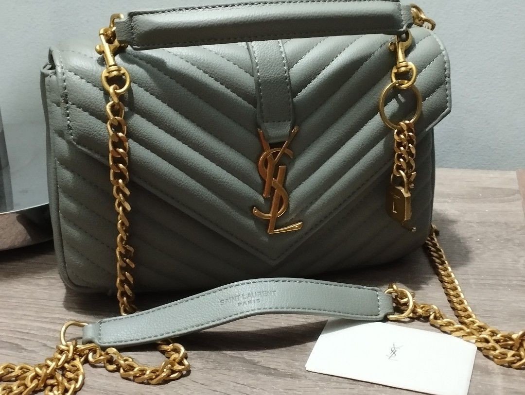YSL College bag (Category: Luxury Bags & Wallets) located in Rizal. Submitted by shoppin_craze (Listing ID 1368909616, Image 2). Description: vintage look ysl college, green gray in color. japan sourced. visible flaws on leather since not used for a long time and was just stored. can possibly be treated for bag spa. coded free sf no Cod Mop- Bpi, Gcash, Maya.