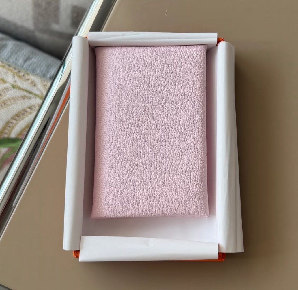 Authentic Hermes Calvi Card Holder Rose Darling (Category: Luxury Bags & Wallets) located in Quezon City. Submitted by breakmyfashion (Listing ID 1369037994, Image 1). Description: Comes in full set with receipt, box and paperbag. Stamp: K Material: Cherve.