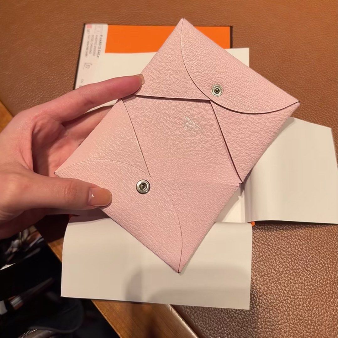 Authentic Hermes Calvi Card Holder Rose Darling (Category: Luxury Bags & Wallets) located in Quezon City. Submitted by breakmyfashion (Listing ID 1369037994, Image 2). Description: Comes in full set with receipt, box and paperbag. Stamp: K Material: Cherve.