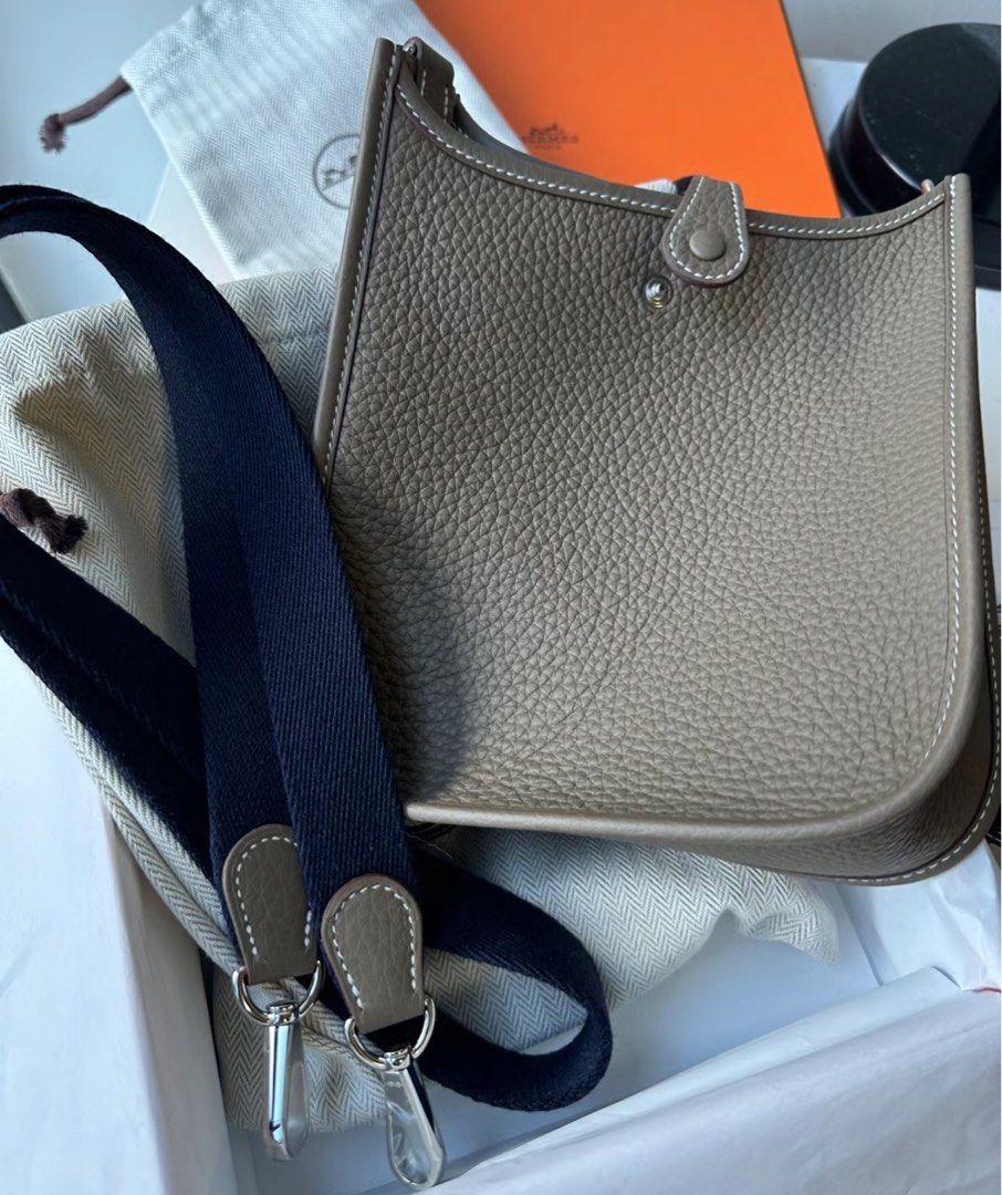 Authentic Hermes Mini Evelyne Etoupe PHW Bleu Indigo Strap (Category: Luxury Bags & Wallets) located in Quezon City. Submitted by breakmyfashion (Listing ID 1369038412, Image 2). Description: Comes in full set with receipt, box, paperbag and dust bag. Stamp: W.