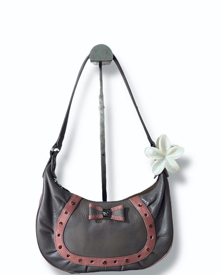 BanaBana Shoulder bag with ribbon (Category: Shoulder Bags) located in Mati. Submitted by classicatch.ph_new (Listing ID 1369007970, Image 1). Description: BanaBana Shoulder Bag so pretty 😍 Normal signs of usage measurement: L 10” H 6” W 2.5” 550+ SF Note: 𝑇ℎ𝑒 𝑐𝑜𝑙𝑜𝑢𝑟/𝑠 𝑠ℎ𝑜𝑤𝑛 𝑚𝑎𝑦 𝑑𝑖𝑓𝑓𝑒𝑟 𝑓𝑟𝑜𝑚 𝑡ℎ𝑒 𝑎𝑐𝑡𝑢𝑎𝑙 𝑐𝑜𝑙𝑜𝑢𝑟/𝑠 𝑑𝑢𝑒 𝑡𝑜 𝑖𝑛𝑑𝑖𝑣𝑖𝑑𝑢𝑎𝑙’𝑠 𝑠𝑐𝑟𝑒𝑒𝑛 𝑠𝑒𝑡𝑡𝑖𝑛𝑔𝑠. 𝑃𝑜𝑡𝑒𝑛𝑡𝑖𝑎𝑙 𝑠𝑖𝑧𝑖𝑛