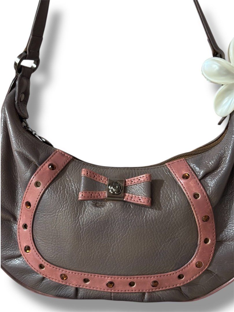 BanaBana Shoulder bag with ribbon (Category: Shoulder Bags) located in Mati. Submitted by classicatch.ph_new (Listing ID 1369007970, Image 3). Description: BanaBana Shoulder Bag so pretty 😍 Normal signs of usage measurement: L 10” H 6” W 2.5” 550+ SF Note: 𝑇ℎ𝑒 𝑐𝑜𝑙𝑜𝑢𝑟/𝑠 𝑠ℎ𝑜𝑤𝑛 𝑚𝑎𝑦 𝑑𝑖𝑓𝑓𝑒𝑟 𝑓𝑟𝑜𝑚 𝑡ℎ𝑒 𝑎𝑐𝑡𝑢𝑎𝑙 𝑐𝑜𝑙𝑜𝑢𝑟/𝑠 𝑑𝑢𝑒 𝑡𝑜 𝑖𝑛𝑑𝑖𝑣𝑖𝑑𝑢𝑎𝑙’𝑠 𝑠𝑐𝑟𝑒𝑒𝑛 𝑠𝑒𝑡𝑡𝑖𝑛𝑔𝑠. 𝑃𝑜𝑡𝑒𝑛𝑡𝑖𝑎𝑙 𝑠𝑖𝑧𝑖𝑛