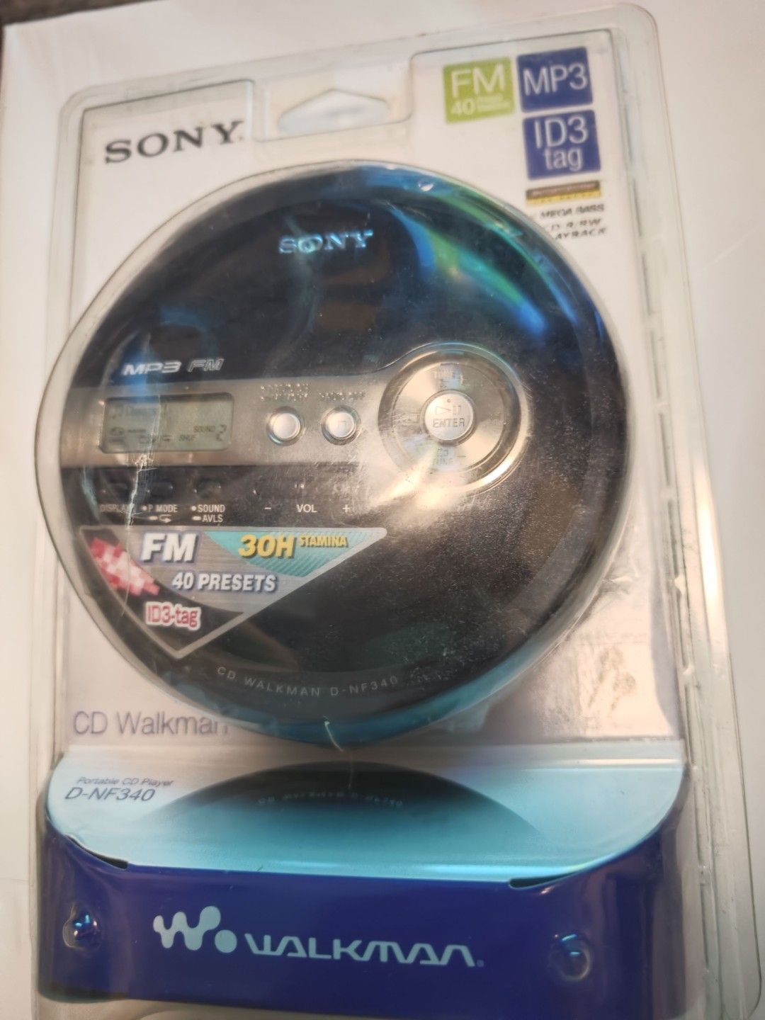 Brand new CD Discman D-NF340 collector's item (Category: Portable Music Players) located in Singapore. Submitted by idsdpro (Listing ID 1369127339, Image 1). Description: Selling the last of a boxload of this model to CD afficionados still seeking good models of Sony's higher models of discman players. * Runs on AA batteries * Reads MP3 and ID3 tags * Built-in FM radio with 40 station memory * CD-R/RW support * Resumes playback from pause point *