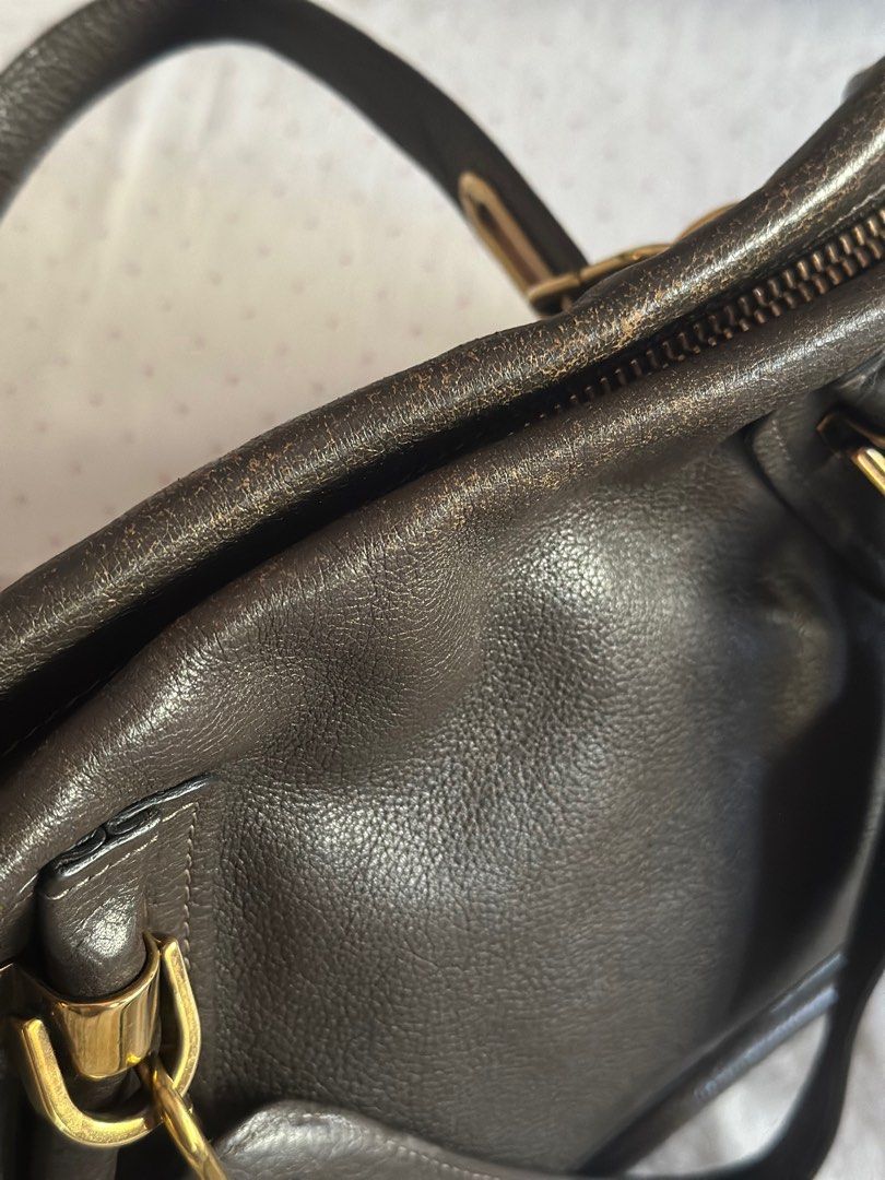 Chloe Medium Paraty (Rock) (Category: Luxury Bags & Wallets) located in Muntinlupa City. Submitted by cooniescloset (Listing ID 1369034178, Image 3). Description: Barely used and kept in storage. Has noticeable leather wear around zipper closure but otherwise great condition. Color: Rock (deep green/gray) Material: Calfskin Leather Dimensions: 37 cm × 12.5 cm × 28 cm (14.6 × 4.9 × 11.0 in) Handle drop: 13 cm (5.1 in) Strap length: 47 cm (18.5 in)