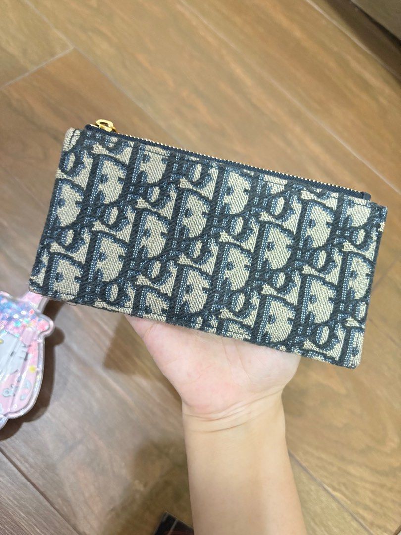 Christian Dior zip card holder (Category: Wallets & Card holders) located in Quezon City. Submitted by jdsdeclutters (Listing ID 1369084529, Image 1). Description: I dont want it anymore.