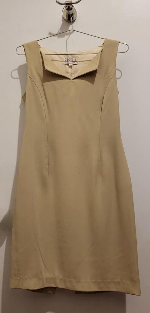 Cignal Portfolio tan dress size 38 (Category: Dresses) located in Quezon City. Submitted by sunlightsleep (Listing ID 1369010576, Image 1). Description: Cignal portfolio Tan dress size 38 on tag.