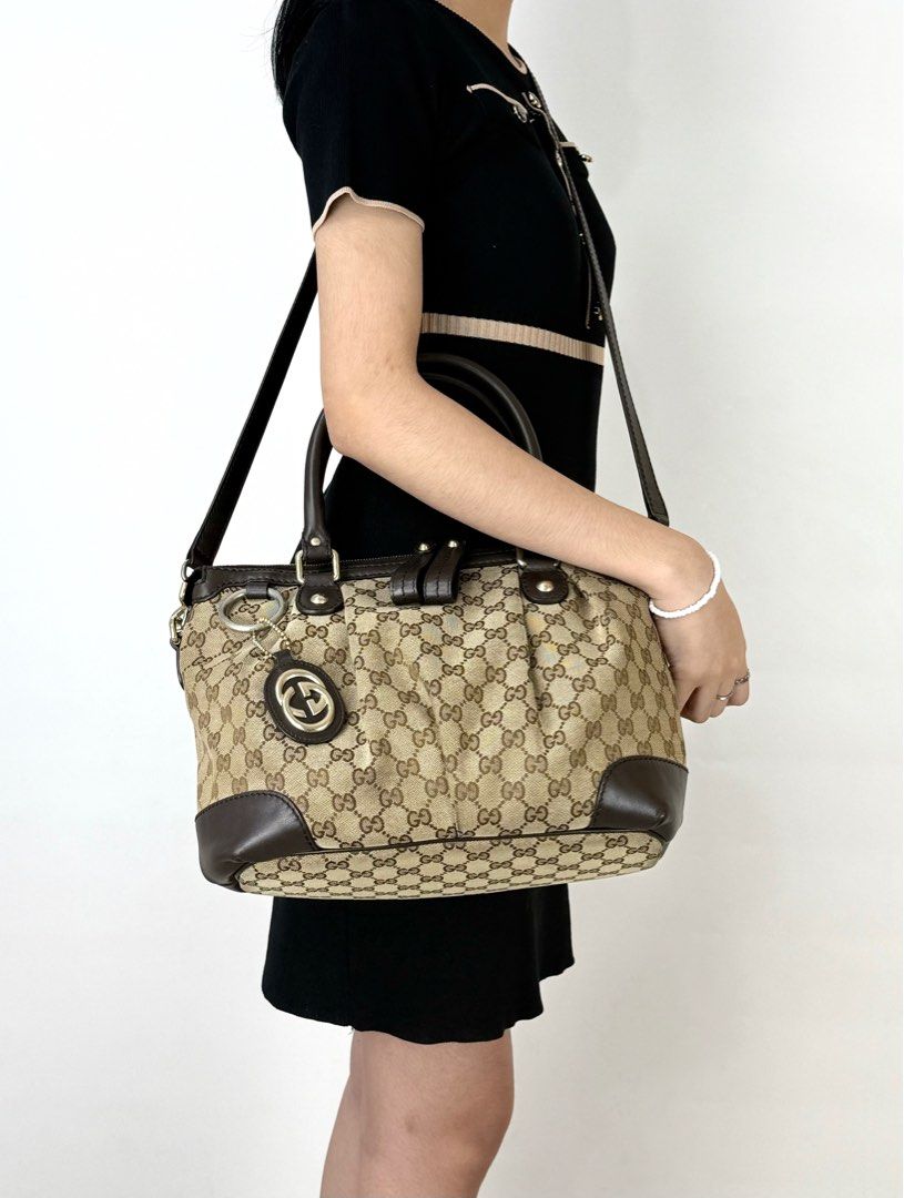 Gucci Satchel (Category: Luxury Bags & Wallets) located in Manila. Submitted by luxuryprelovedbagsby_by_agnes (Listing ID 1368998363, Image 3). Description: GG Sukey Top Handle Satchel GG Canvas Medium 12”W x 10”H x 5”D 42k 📌 Accepting credit card payments Safe and contactless payment up to 36 months! Pay conveniently online . We offer you a safe and convenient way of paying online via link or email. No need to go out to pay for your purchases. 