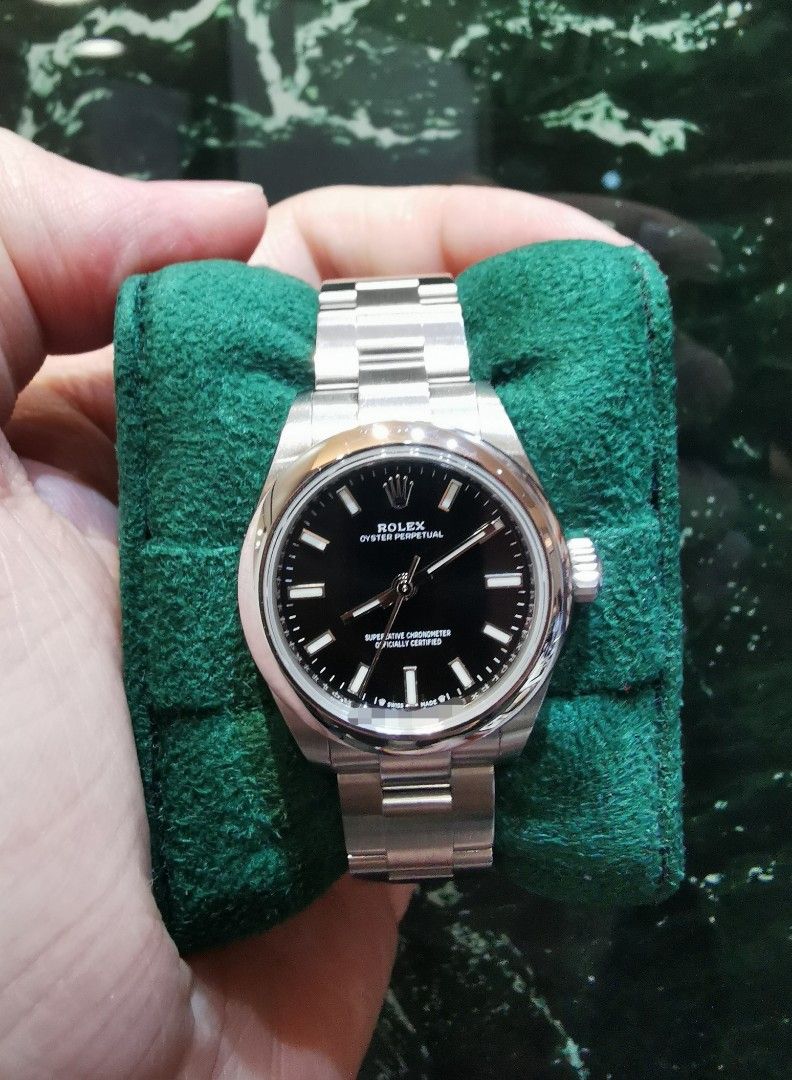 June 2021 Rolex Oyster perpetual OP28 black 276200 (Category: Watches) located in Singapore. Submitted by hengwatch (Listing ID 1369088519, Image 1). Description: Rolex Oyster perpetual OP 28 black dial Model number 276200 Mint condition Comes with box and cert dated June 2021 With white hang tag with matching serial number Selling for $6400 Subscribe to our tele-gram group for constant updates //t.me/HengWatch Hsbc and standard chartered and dbs