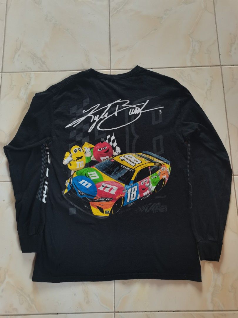 Nascar M&M Kyle Busch Long Sleeve Shirt (Category: Coats, Jackets and Outerwear) located in La Trinidad. Submitted by randoruthrifts (Listing ID 1368966721, Image 2). Description: Nascar M&M Kyle Busch Long Sleeve Shirt Cut tag Dimes : Length = 28 Width : 19.