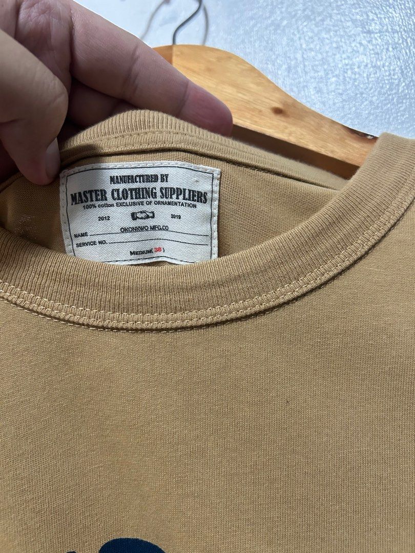 OKONKWO MILITARY TEE (Category: Tshirts & Polo Shirts ) located in Calamba. Submitted by jannstuff (Listing ID 1368962610, Image 3). Description: OKONKWO MILITARY TEE “ROUGH WEAR CLOTHING CO., INC” Size: M Excellent condition Price: 999 Measurement: Length: 27 Width: 19 Dm.