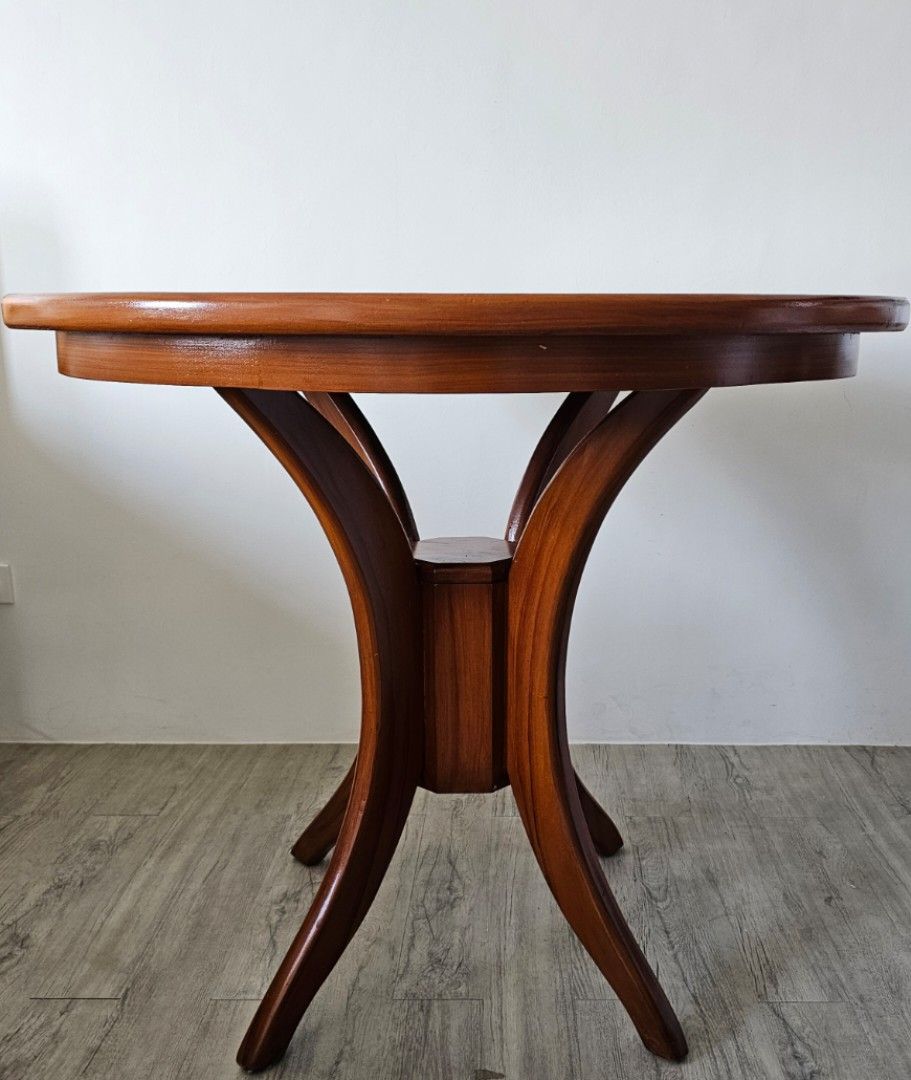 Round table (Category: Tables & Sets) located in Pasig City. Submitted by bubbles108 (Listing ID 1369055923, Image 2). Description: Diameter: 90 cm Height: 77 cm Material: Tanguile wood Condition: excellent, well-maintained It is sturdy due to solid wood construction. RFS: Too large for my space Note: Tabletop and legs are fixed.