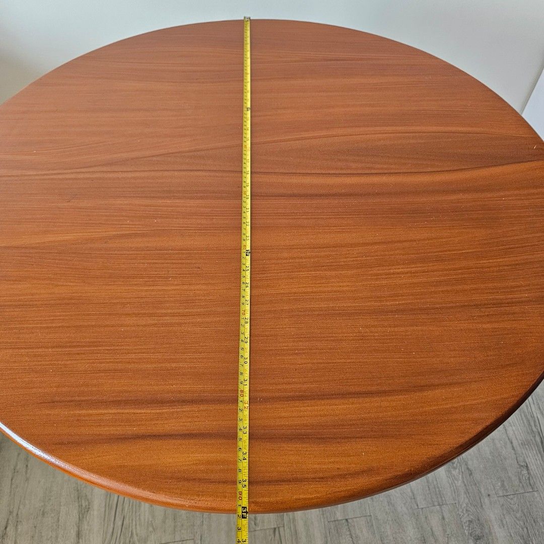Round table (Category: Tables & Sets) located in Pasig City. Submitted by bubbles108 (Listing ID 1369055923, Image 3). Description: Diameter: 90 cm Height: 77 cm Material: Tanguile wood Condition: excellent, well-maintained It is sturdy due to solid wood construction. RFS: Too large for my space Note: Tabletop and legs are fixed.