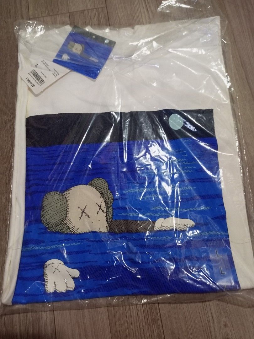 Uniqlo x Kaws (Category: Tshirts & Polo Shirts ) located in Pateros City. Submitted by anthonymj (Listing ID 1369029694, Image 1). Description: for sale or swap Uniqlo x Kaws 2023 edition brand new with tag Large.