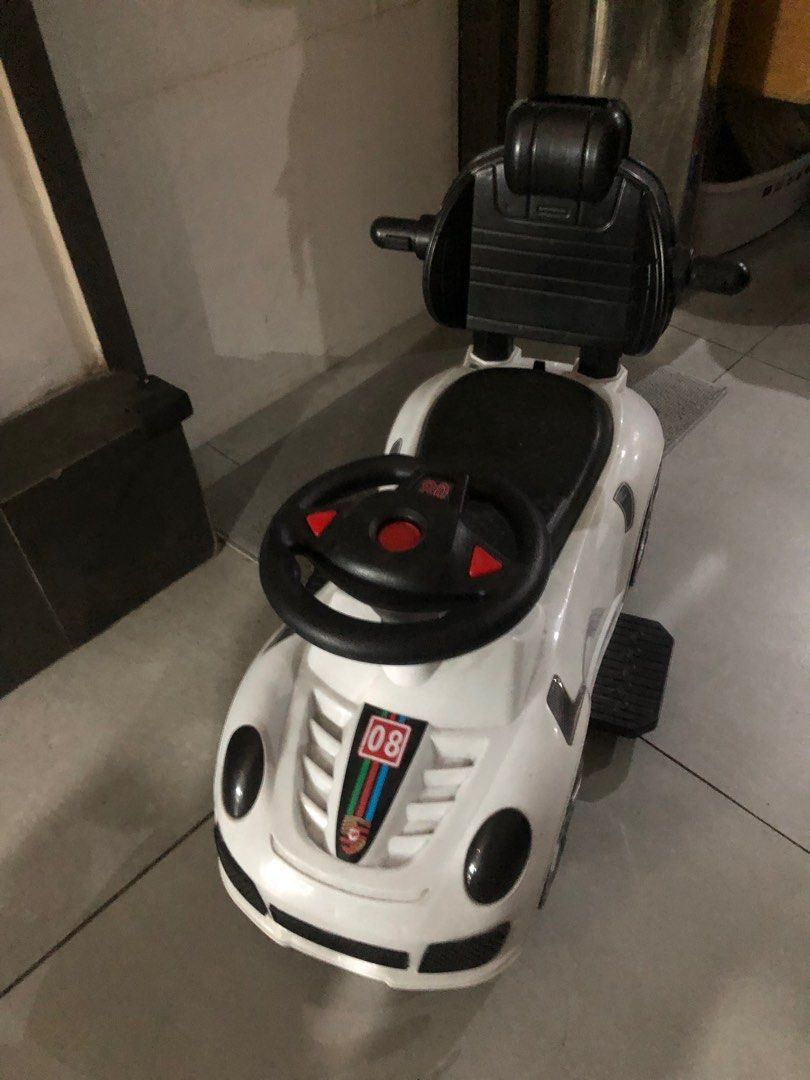White Car for Baby/Kid (Category: Infant Playtime) located in Manila. Submitted by artsygunda (Listing ID 1369052238, Image 1). Description: Good condition Sold as is With lights and sounds (but havent tried again if it's working) With handle but has been misplaced .
