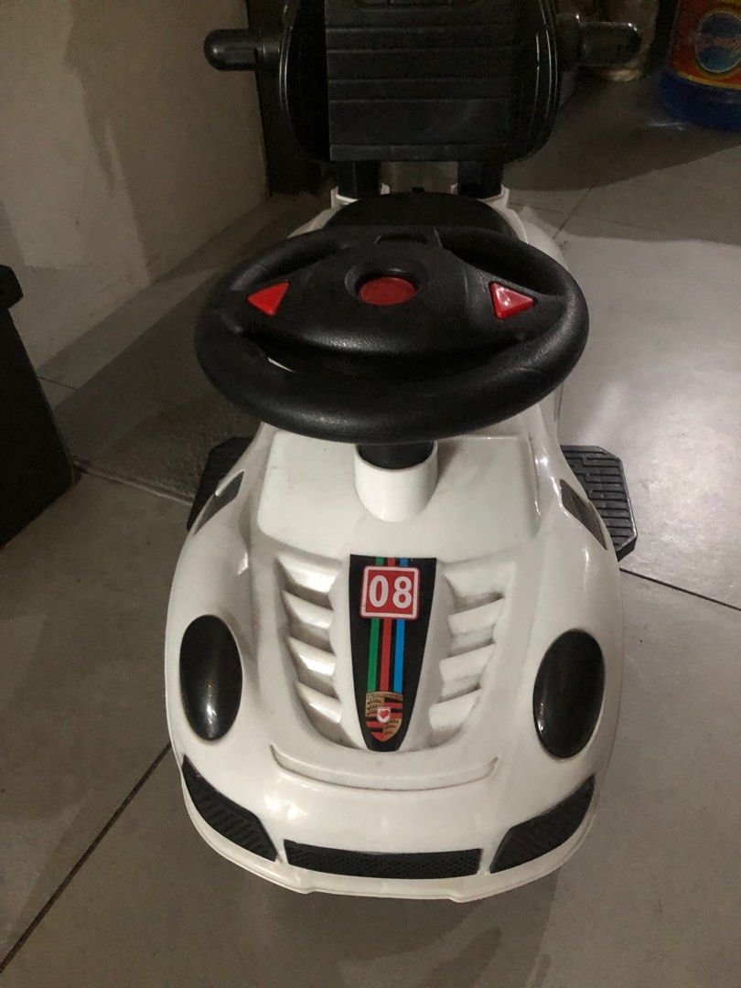 White Car for Baby/Kid (Category: Infant Playtime) located in Manila. Submitted by artsygunda (Listing ID 1369052238, Image 2). Description: Good condition Sold as is With lights and sounds (but havent tried again if it's working) With handle but has been misplaced .