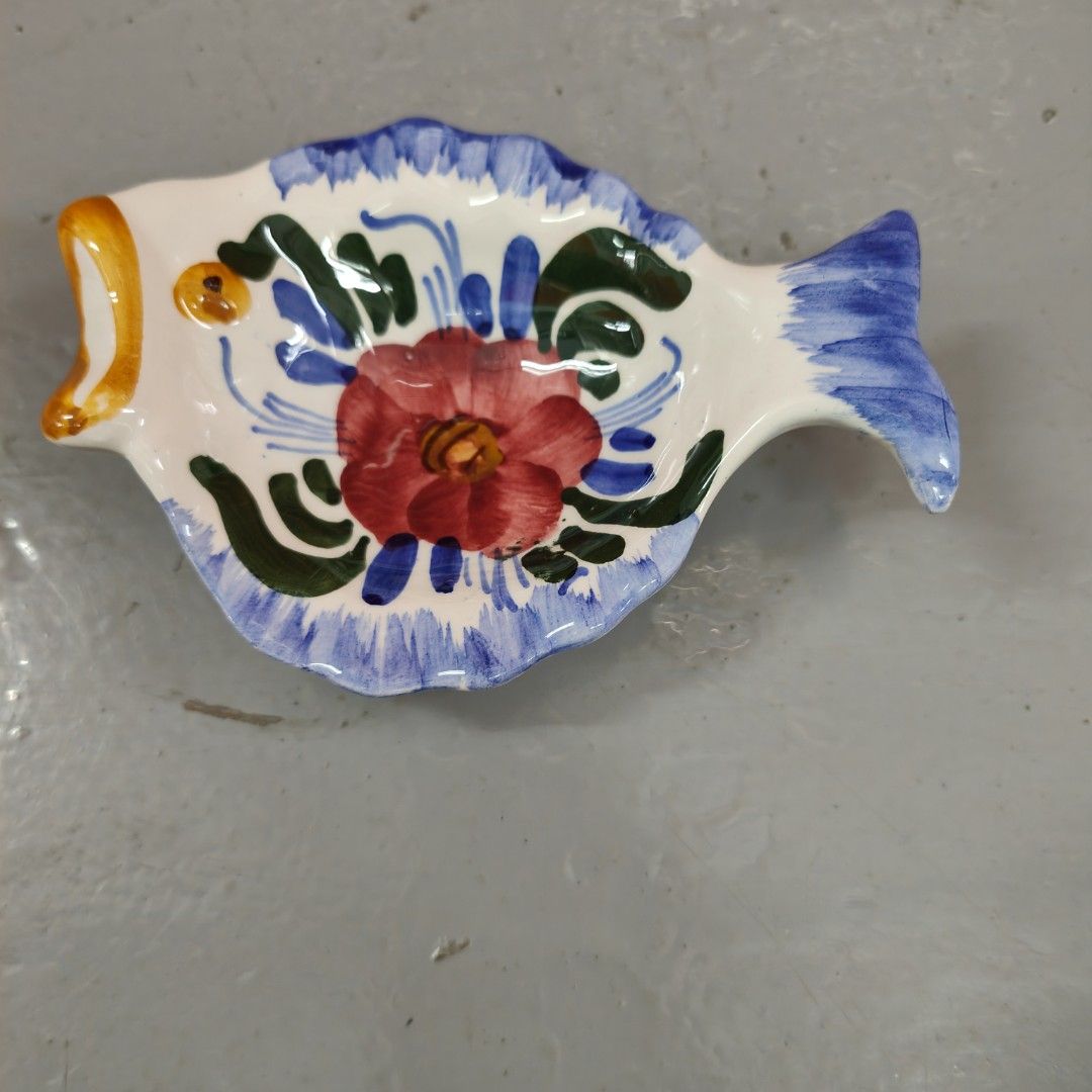 a hand-painted ceramic dish plate