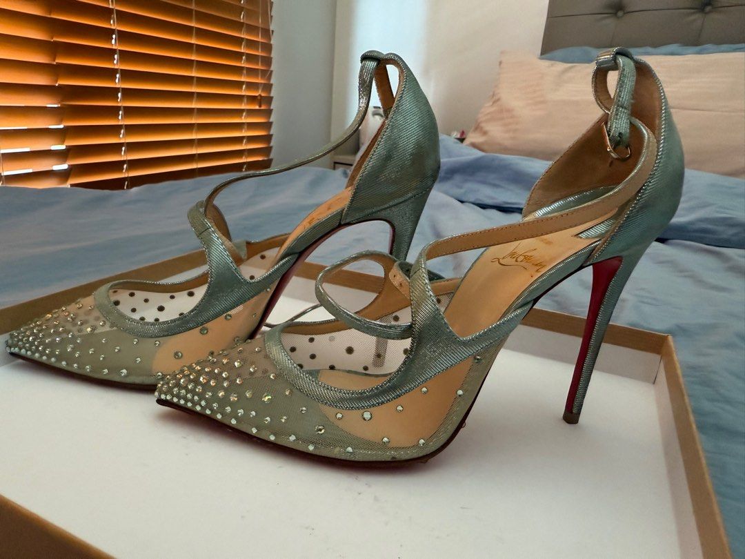 Authentic Christian Louboutin heels (Category: Heels) located in Makati City. Submitted by thegarmentcloud (Listing ID 1369217646, Image 1). Description: Used 1x (during my wedding only) There are still protective films at the bottom of the shoes -authentic, store bought -complete with box and dustbags Php 18000 (nego) -heels: 4inches but really comfy because of the soft mesh part Size 7 -crystals are all intact and complete -slightly negotiable.