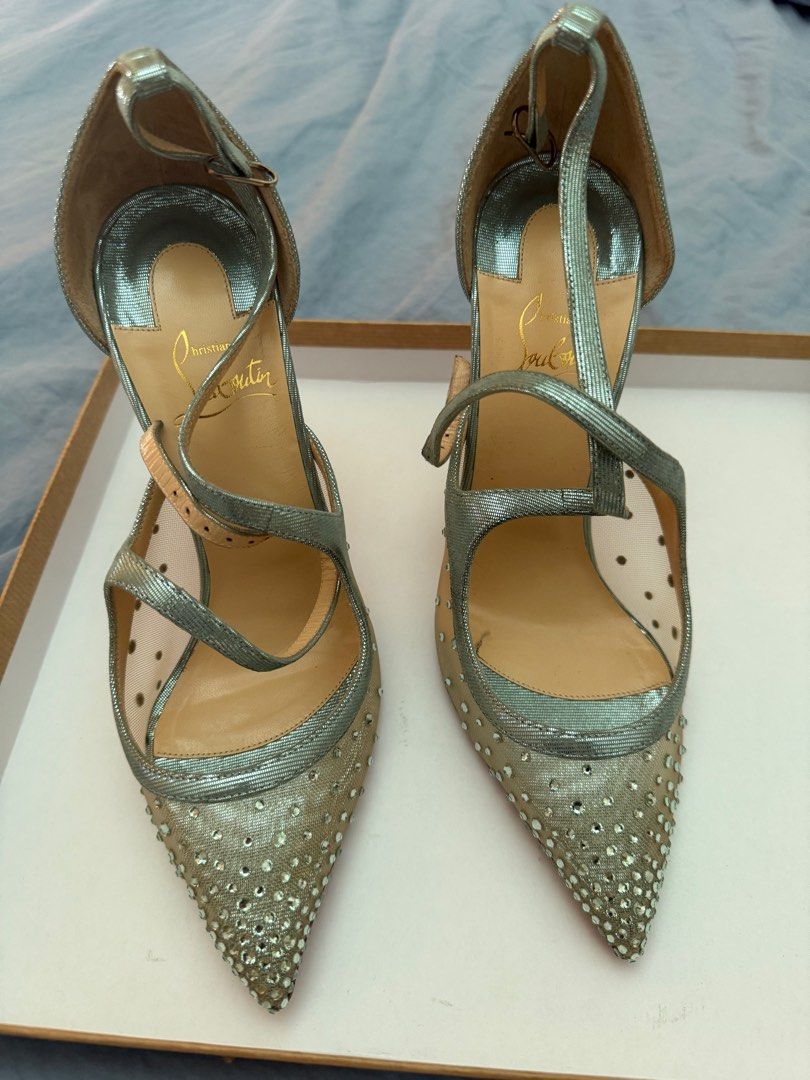 Authentic Christian Louboutin heels (Category: Heels) located in Makati City. Submitted by thegarmentcloud (Listing ID 1369217646, Image 3). Description: Used 1x (during my wedding only) There are still protective films at the bottom of the shoes -authentic, store bought -complete with box and dustbags Php 18000 (nego) -heels: 4inches but really comfy because of the soft mesh part Size 7 -crystals are all intact and complete -slightly negotiable.