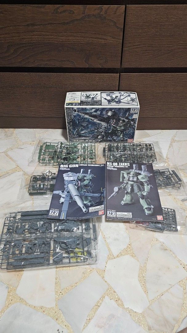 Bandai HG 1/144 GUNDAM Thunderbolt MS-06 ZAKU II+BIG GUN SET (Category: Gundam Model Kits) located in Singapore. Submitted by unhingedsnaps (Listing ID 1369200054, Image 2). Description: Bought it back in Japan during the HGUC Thunderbolt hype. Box opened for checking, runners sealed as per photo. Minor scuffs on box from travels. Serious buyers/collectors only. Following ebay pricing..