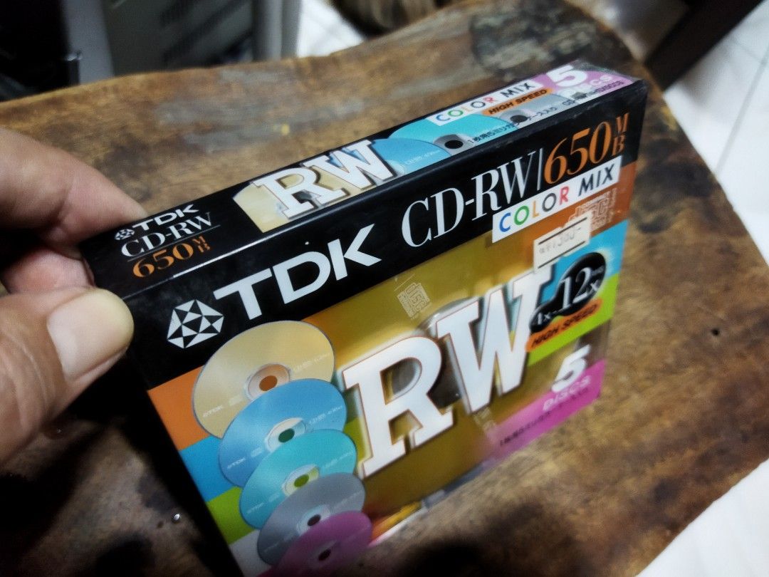 Branded Blank CD-RW (Category: CDs & DVDs) located in Pasay City. Submitted by marineljapansurplus (Listing ID 1167645682, Image 2). Description: Blank CD-RW 1. Brand: TDK set of 5pcs/pack with plastic case sealed color mix 180 pesos.