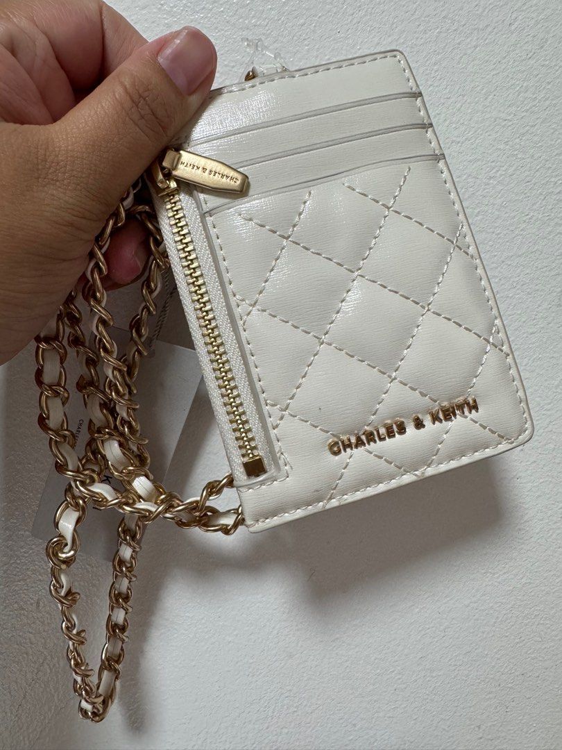 Charles and Keith Card Holder w/ Chain (Category: Wallets & Card holders) located in Rizal. Submitted by loveasty (Listing ID 1369267969, Image 1). Description: Brand new with box and tag— perfect gift! :) 💸: GCash 🚚: Grab/ Lalamove RFS: Duplicate.
