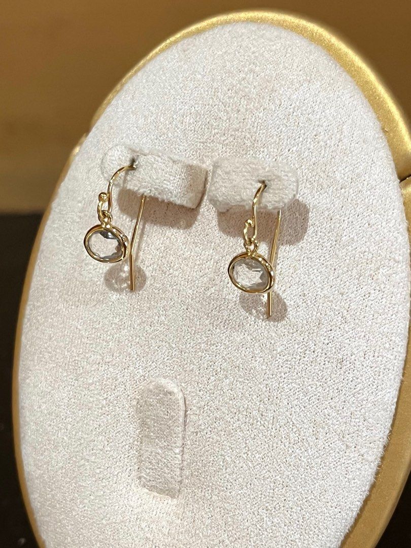 Clear Crystal Dangling Hook Earrings (Category: Earrings) located in Quezon City. Submitted by prettynrandom (Listing ID 1369257204, Image 2). Description: PRODUCT DESCRIPTION: -Clear Crystal Glass Stone Dangling Earrings -Designed by Pretty&Random. -Brand New. -Listing includes a pink pouch bag. -Faceted clear crystal glass stone with bezel made of gold plated brass. -Hook material is 14K Gold Filled. (Gold filled is not solid gold but is strong
