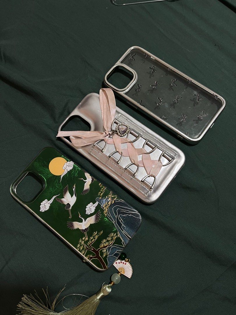 iPhone 13 Case Coquette Ribbon Green Silver Grey (Category: Cases & Sleeves) located in Pasig City. Submitted by mariamaria__ (Listing ID 1369211835, Image 1). Description: For take all only - Pasig City.