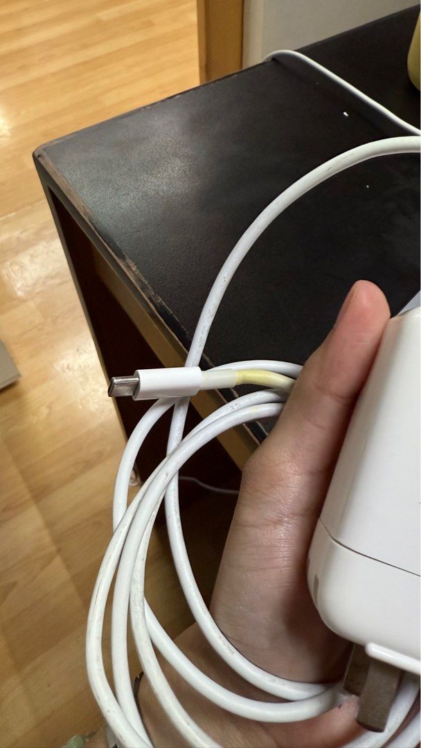 Original Macbook USB C cord and adapter (Category: Chargers) located in Manila. Submitted by daisydeclutters (Listing ID 1369148556, Image 3). Description: Original Macbook USB C cord + adapter. Not being used so will sell instead. No issues apart from the slight yellowing on the ends of the cord. :).