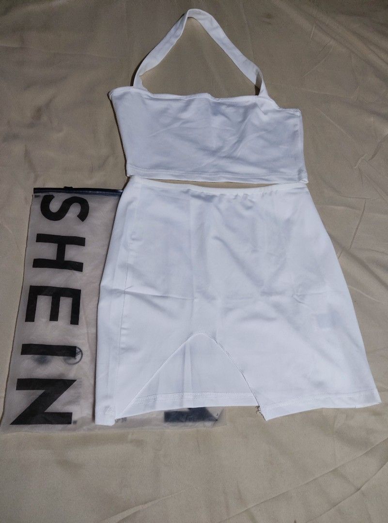 Shein coordinates white halter top with mini skirt (Category: Sets & Coordinates) located in Pasig City. Submitted by mara_0125 (Listing ID 1369197910, Image 3). Description: Shein coordinates white halter top with mini skirt.