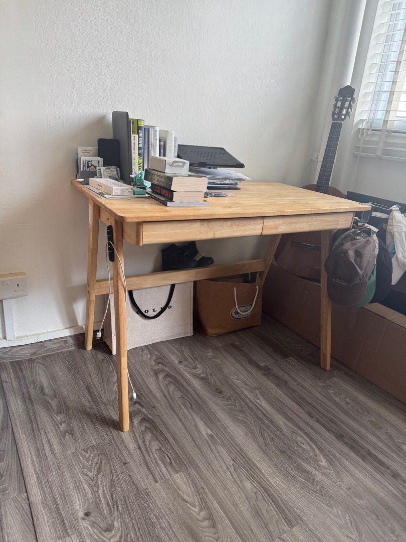 Study Table (Category: Tables & Sets) located in Singapore. Submitted by homie24 (Listing ID 1369209957, Image 1). Description: A compact study table 100x60 cm with 2 drawers. Condition is great. Only had it for a year. .