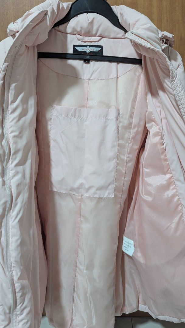 Winter Jacket (Category: Coats, Jackets and Outerwear) located in Singapore. Submitted by zetrahac (Listing ID 1369259556, Image 2). Description: Light pink down jacket from Winning. I dry cleaned it after I last wore it years back (the dry cleaning tags are still on). The hood is detachable and there is also a detachable fur lining for the hood. The jacket is small for me ( 163cm, 50kg) hence I'm selling it. I have had it since I was young so it