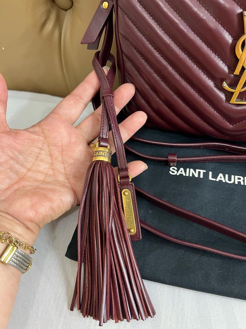 YSL Lou Camera Bag (Category: Luxury Bags & Wallets) located in Cavite. Submitted by louiessaliviac (Listing ID 1369204407, Image 3). Description: YSL Monogram Lou Camera Bag 95% new, used only 2x elegant burgundy color, gold hardware includes removable tassel and dustbag Selling for 72,000 retails for 110K ++ in Adora Manila and US Selling for 72,000 .