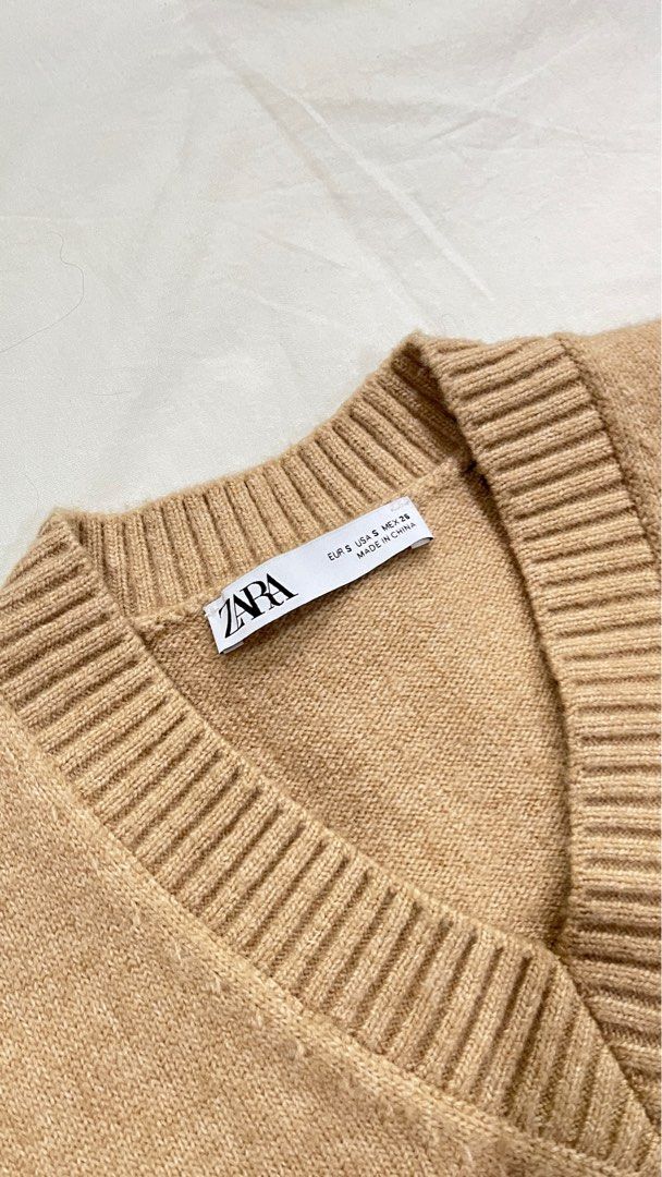 Zara Plain Knit Waistcoat (Category: Sleeveless) located in Rizal. Submitted by hansio (Listing ID 1369189084, Image 3). Description: 🎐 Details • Worn only twice • Looks and feels brand new • Color: Mid-camel • Size: Onesize • Chest width: ~45cm • Length: ~52cm • Bought for: P1,690 (Dec 2024) RFS: Change of style MOP: E-wallets or bank transfer MOD: J&T or Express delivery .
