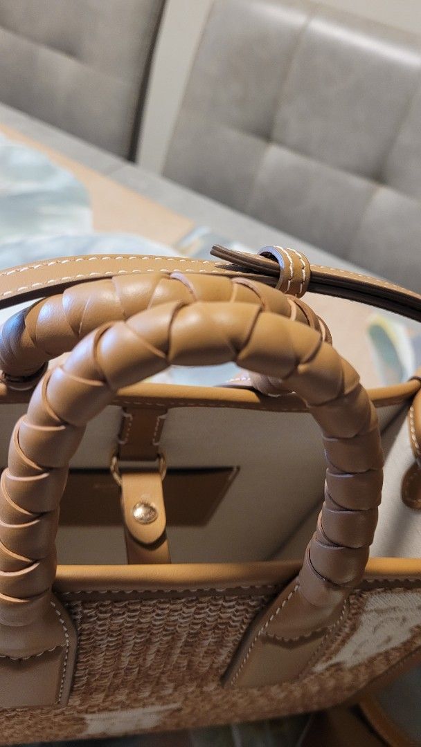 Authentic Burberry Mini Freya Bag Natural (Category: Luxury Bags & Wallets) located in Quezon City. Submitted by breakmyfashion (Listing ID 1369387686, Image 3). Description: Comes with box, tags and dust bag. Dimensions: Width 23.5cm/ 9.3” Height 20cm/ 7.9” Depth 9cm/ 2.5” Min. strap drop 49cm/ 19.3” Max. strap drop 54cm/ 21.3” Material: Raffia-effect fabric (47% polyester, 33% viscose, 15% polyamide, 5% elastane) Topstitched calf leather trim T