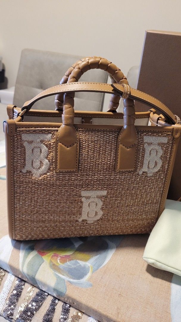 Authentic Burberry Mini Freya Bag Natural (Category: Luxury Bags & Wallets) located in Quezon City. Submitted by breakmyfashion (Listing ID 1369387686, Image 2). Description: Comes with box, tags and dust bag. Dimensions: Width 23.5cm/ 9.3” Height 20cm/ 7.9” Depth 9cm/ 2.5” Min. strap drop 49cm/ 19.3” Max. strap drop 54cm/ 21.3” Material: Raffia-effect fabric (47% polyester, 33% viscose, 15% polyamide, 5% elastane) Topstitched calf leather trim T