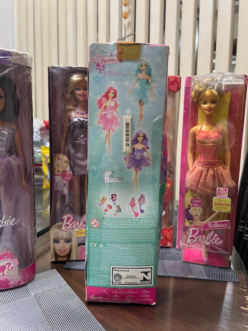 BARBIE SET (Category: Kids Toys) located in Paranaque City. Submitted by hayumii (Listing ID 1369457743, Image 3). Description: FOR TAKE ALL slightly damaged box due to storage but never opened 2007 Mattel Barbie Pink Fairy Fun Doll 2007 Barbie Ballerina Doll Purple Ballet Outfit 2009 Mattel I Can Be Ballerina Barbie Doll 2010 Barbie February Amethyst Birthstone Collection Doll Mattel 2004 Hearts & Kisses Barbie Doll Valentine Mattel.