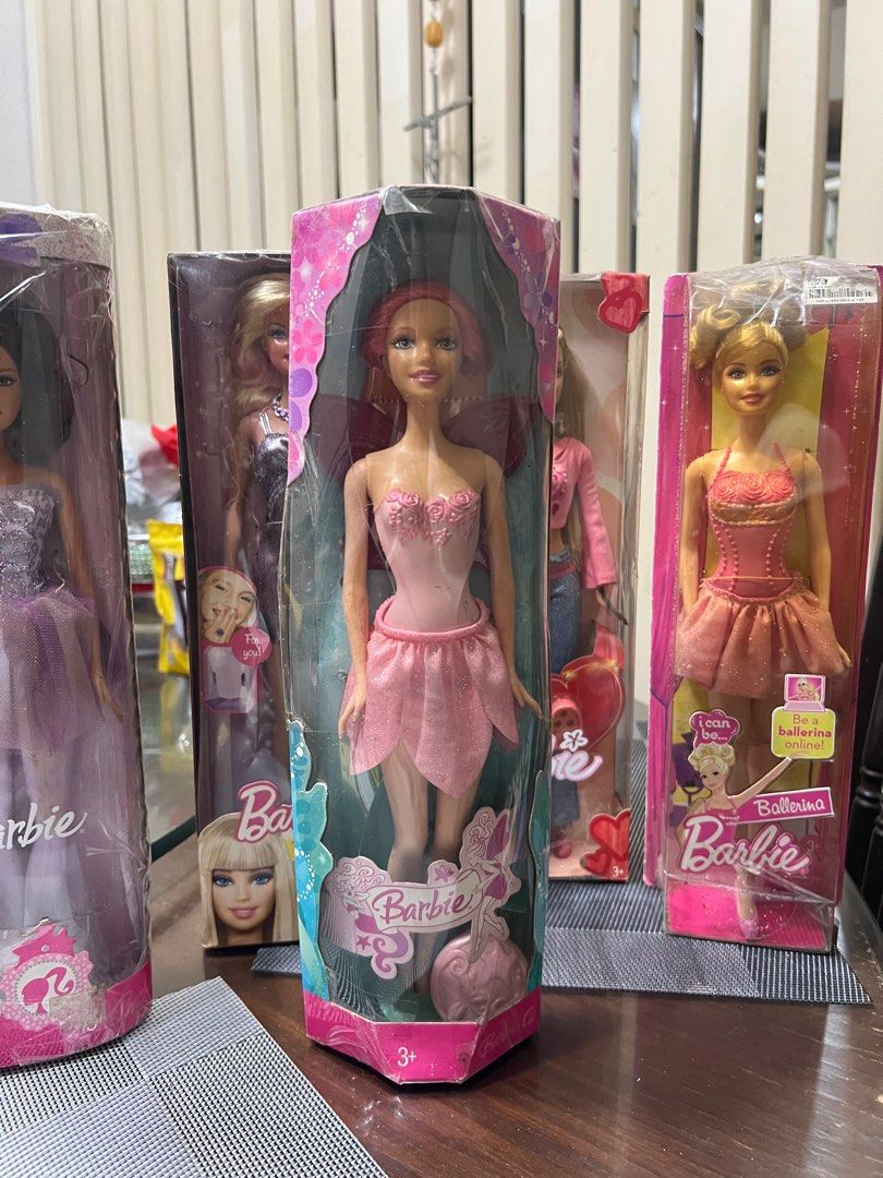 BARBIE SET (Category: Kids Toys) located in Paranaque City. Submitted by hayumii (Listing ID 1369457743, Image 2). Description: FOR TAKE ALL slightly damaged box due to storage but never opened 2007 Mattel Barbie Pink Fairy Fun Doll 2007 Barbie Ballerina Doll Purple Ballet Outfit 2009 Mattel I Can Be Ballerina Barbie Doll 2010 Barbie February Amethyst Birthstone Collection Doll Mattel 2004 Hearts & Kisses Barbie Doll Valentine Mattel.