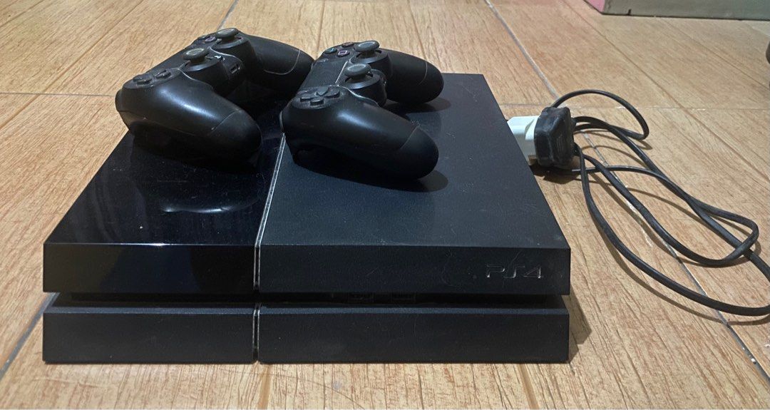 BUNDLE‼️ Original Playstation 4 game console, comes with controllers, games and a USB Data cable (Category: PlayStation) located in Quezon City. Submitted by kylina (Listing ID 1369354865, Image 2). Description: MOP: Gcash or bank transfer Rfs: Decluttering - You may dm me for more pictures of the product - The PS4 is used but has no damage and is still working - Some of the games are used but not damaged, and some are sealed and have not been us