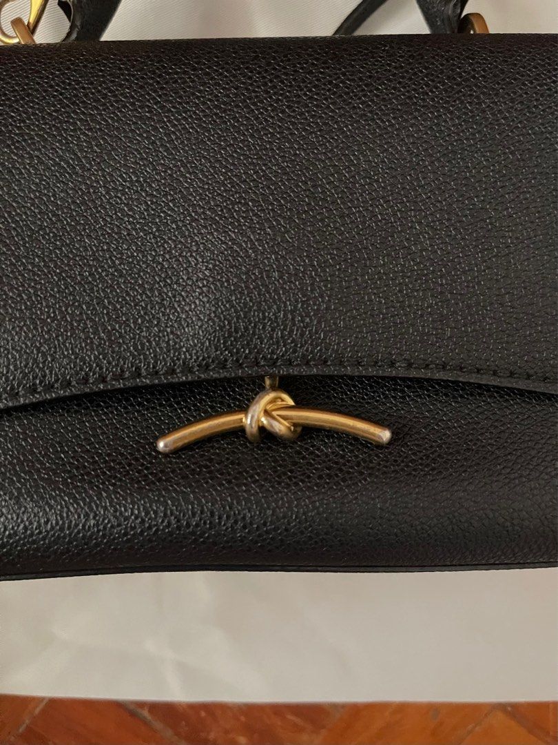 CHARLES AND KEITH - Crossbody Bag (Category: Cross-body Bags) located in Bacoor. Submitted by da.clutter (Listing ID 1369391852, Image 3). Description: - Bought from Charles&Keith (MOA Branch) in 2020 hence the old logo - With the bag and card - Price still negotiable !!!.