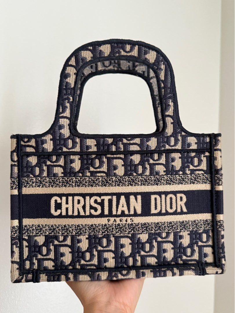 Christian Dior Book Tote Mini (Category: Luxury Bags & Wallets) located in Manila. Submitted by luxpreloved_ (Listing ID 1369361444, Image 1). Description: Dior Book Tote Mini Inclusions: Dust bag.