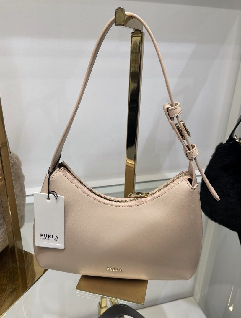 FURLA FEBE HOBO BAG (Category: Luxury Bags & Wallets) located in Angeles City. Submitted by shbe.shps (Listing ID 1369438955, Image 1). Description: • super nice kili kili bag and hindi masakit sa shoulders. • zipper is also very smooth! Bought from japan Comes with paperbag and dustbag and its small booklet.