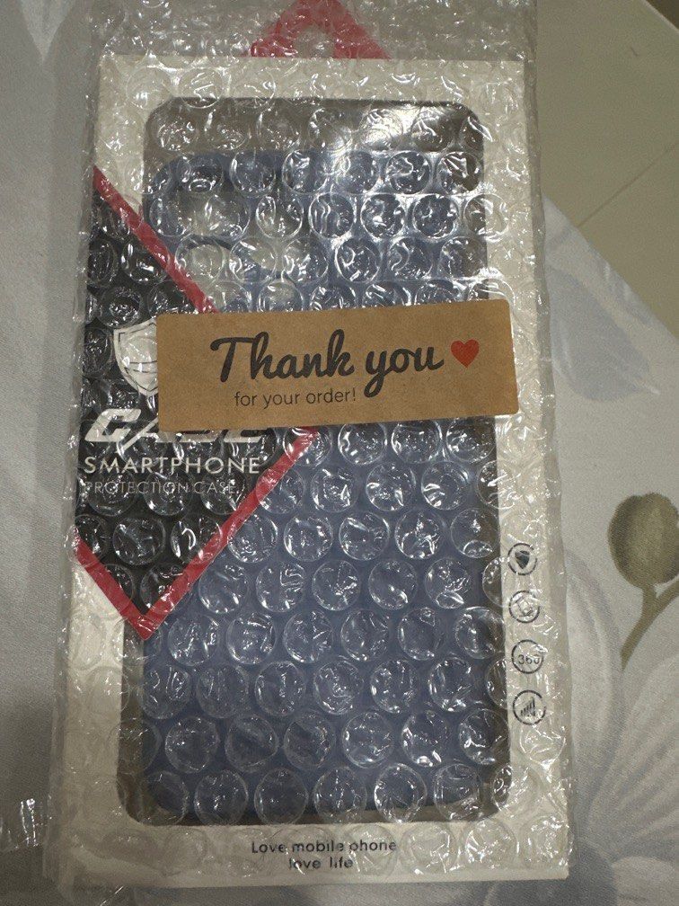 iPhone case (Category: Cases & Sleeves) located in Singapore. Submitted by rosetwinkles (Listing ID 1369447216, Image 1). Description: “TAKEN” Case for iPhone 13 Pro or pro max. Not sure..